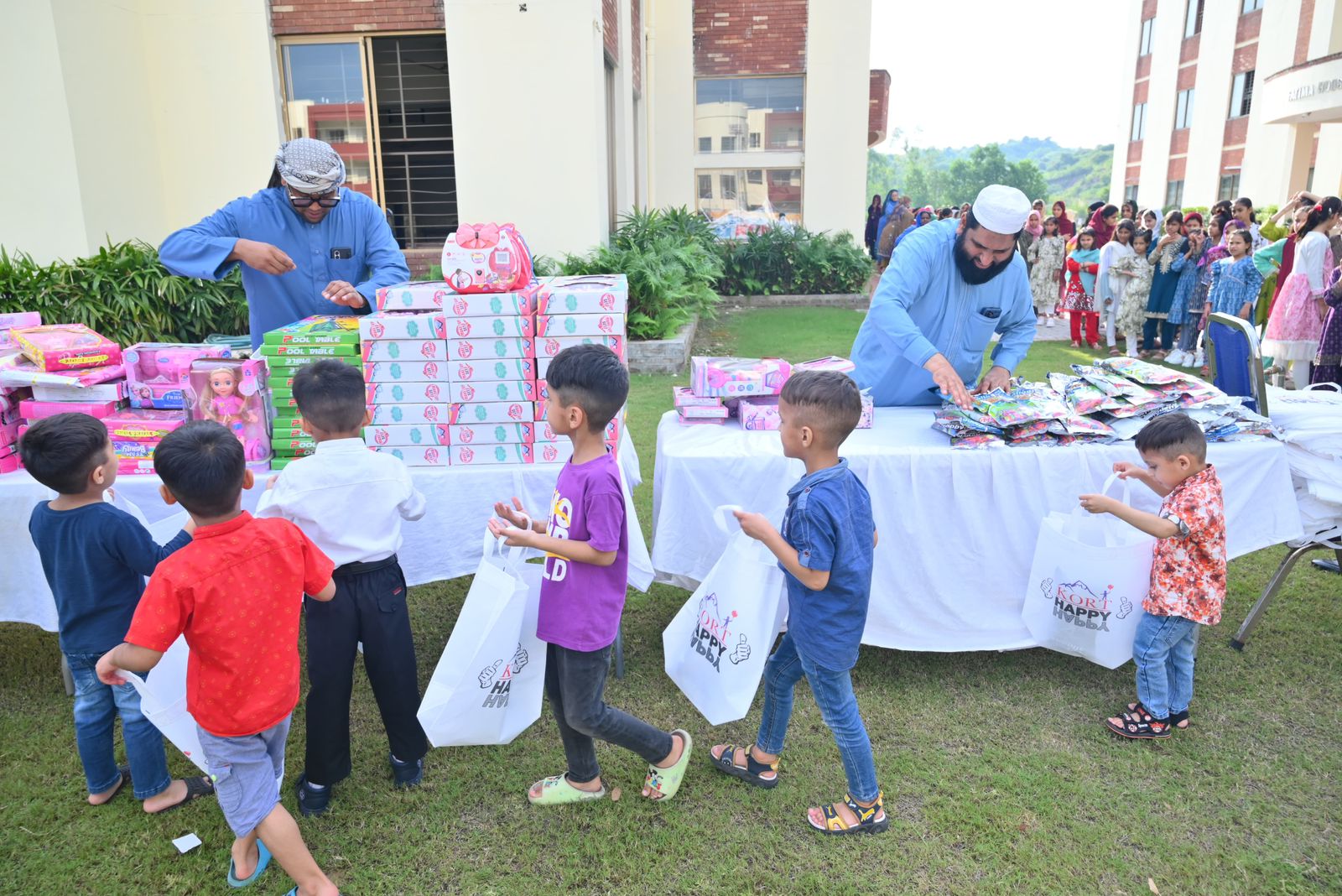 Gift distribution to children at the KORT welfare drive