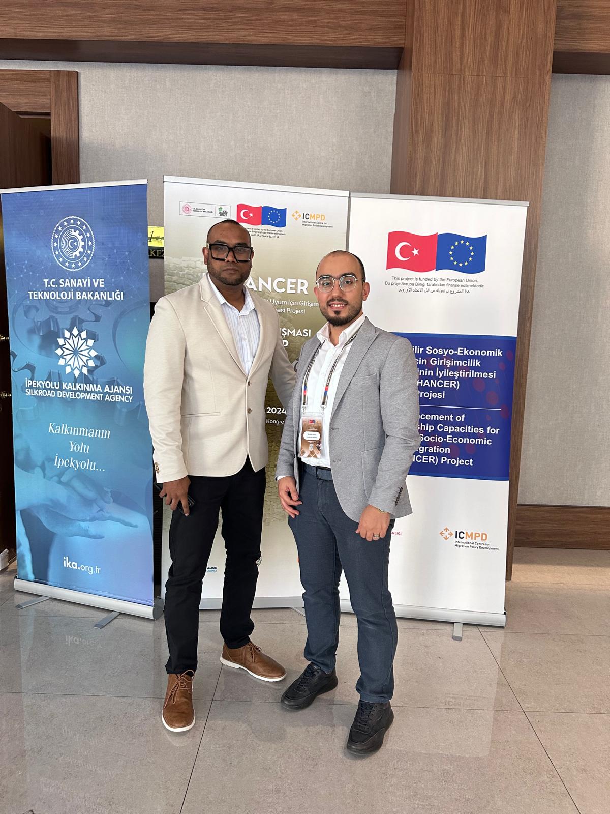 Mohamed Sameer Ismail at the EU-funded ENHANCER project banners in Gaziantep, Türkiye