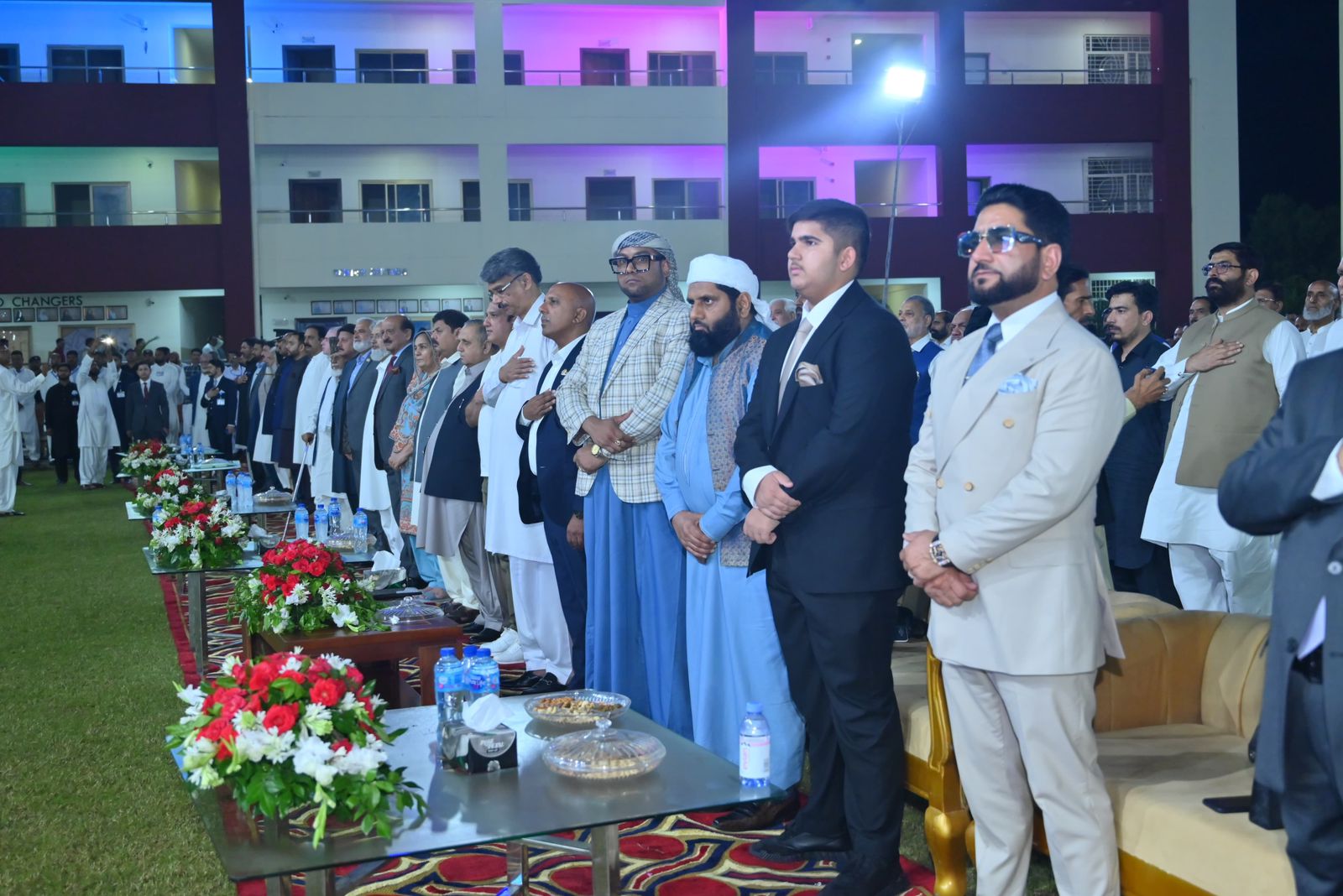 KORT 19th anniversary ceremony guests standing for the anthem